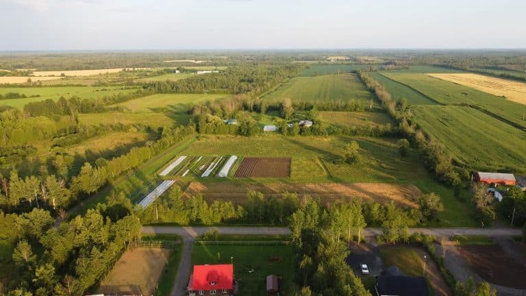 An aerial view of a farm and farmland in Ontario.