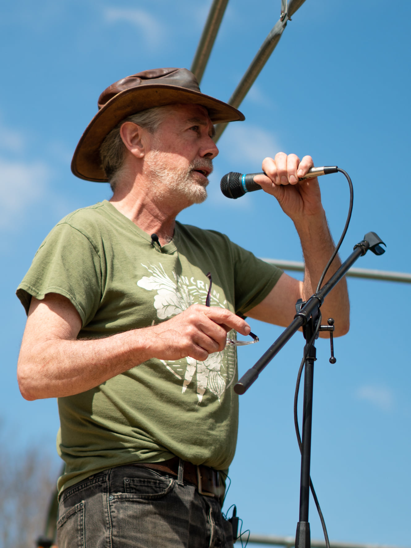 Chris Krucker Man speaks into a microphone.