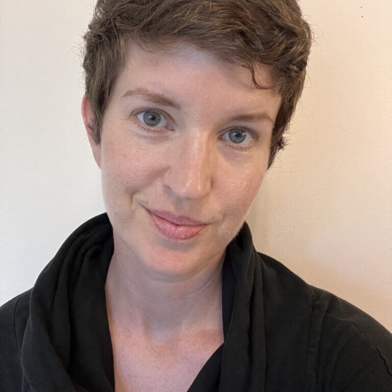 A middle-aged white woman with short hair.