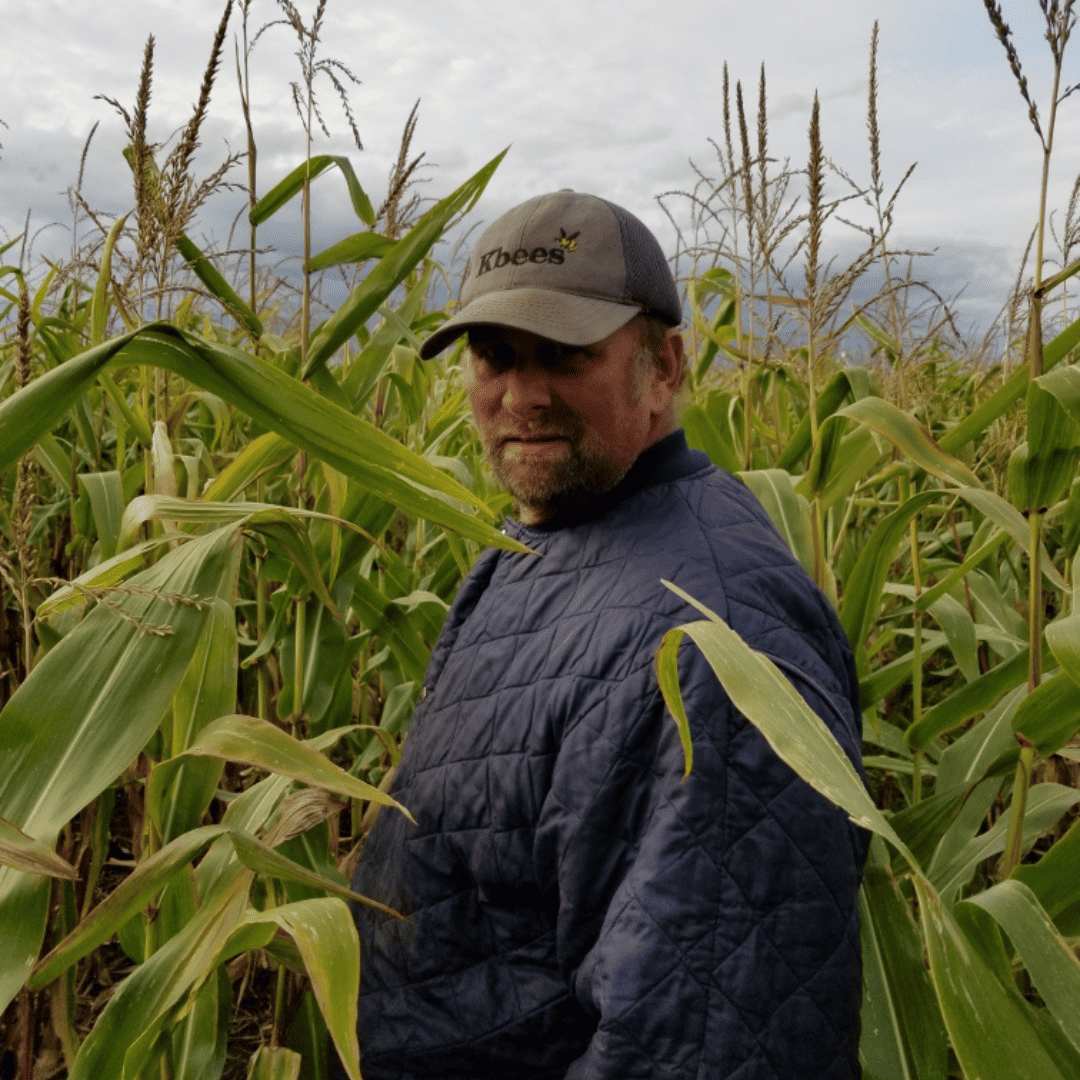 Ken Bassindale in a corn field.