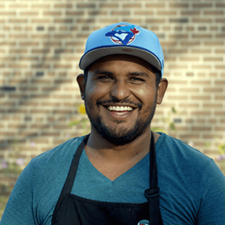 Orlando Martin Lopez Gomez in an apron.